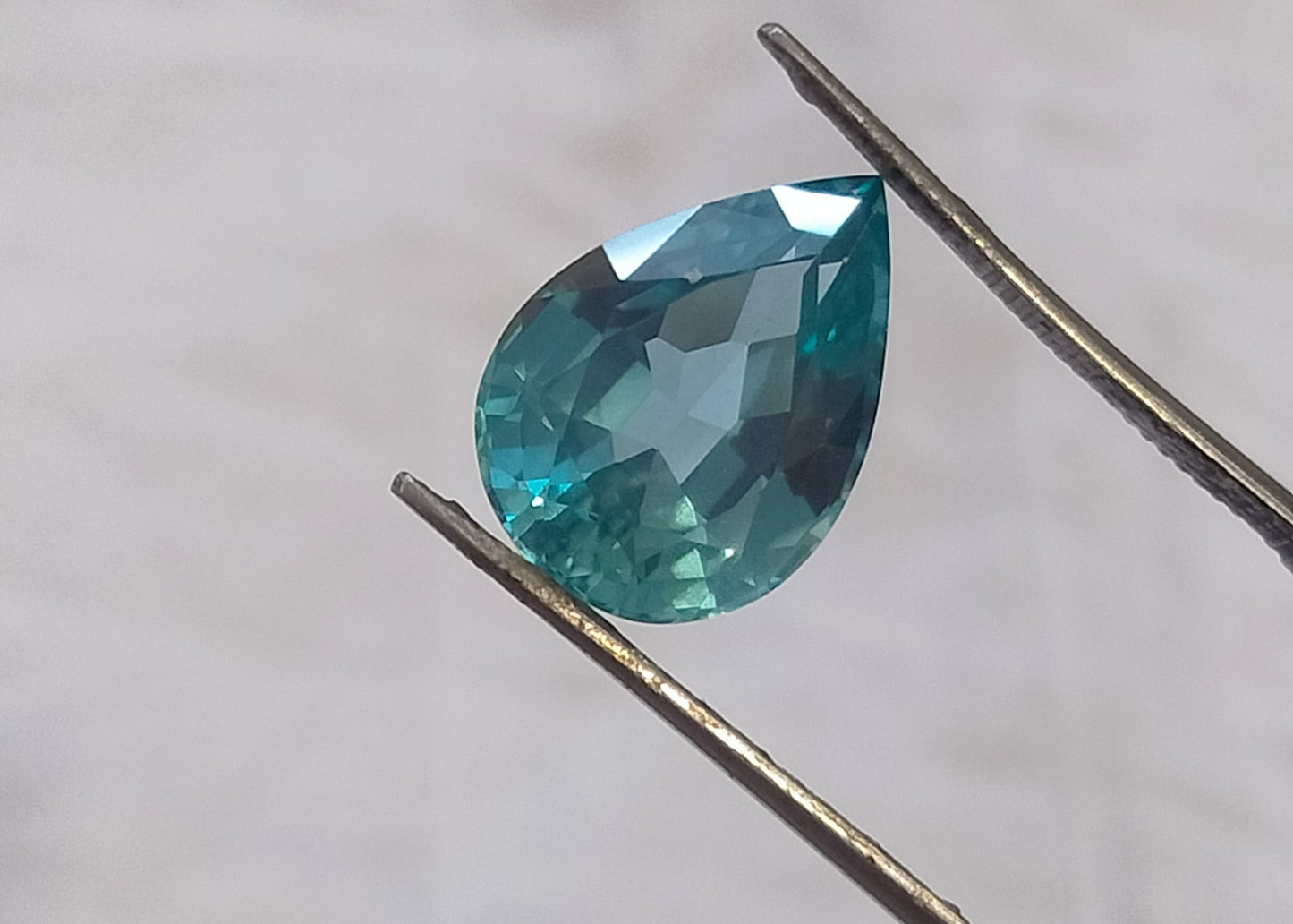 "Stunning Lab Grown Paraiba - 6.75cts, 10×14mm Pear Cut  Neon Blue Color"