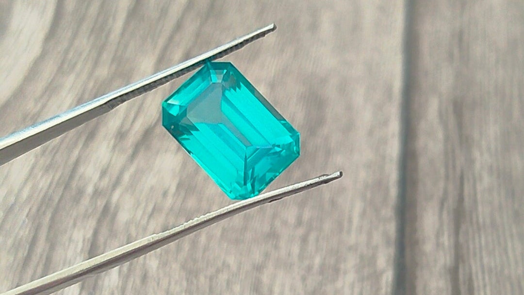 "Stunning Lab Grown Paraiba - Large 10.85cts , 10x14mm  Emerald Cut  Vivid Neon-Blue Color"