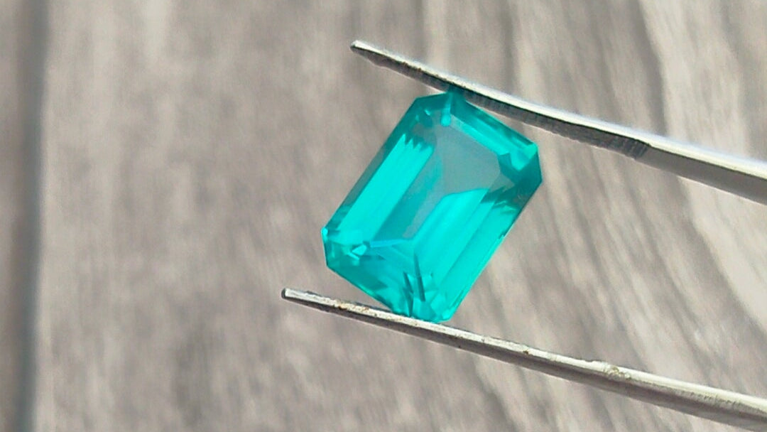 "Stunning Lab Grown Paraiba - Large 10.85cts , 10x14mm  Emerald Cut  Vivid Neon-Blue Color"