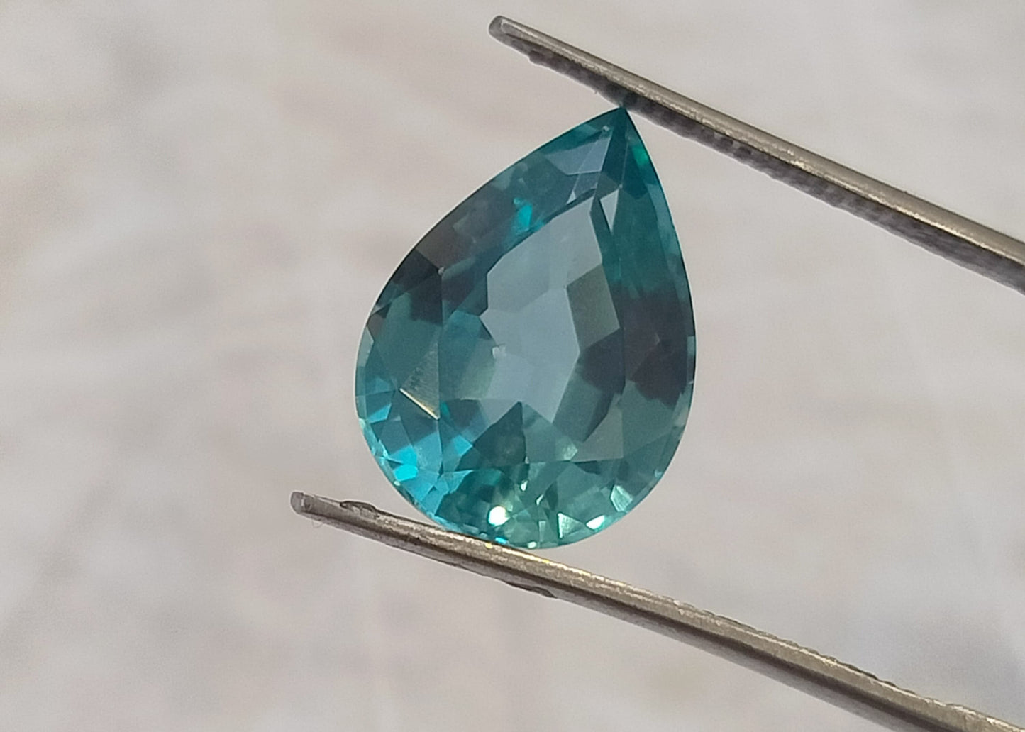 "Stunning Lab Grown Paraiba - 6.75cts, 10×14mm Pear Cut  Neon Blue Color"